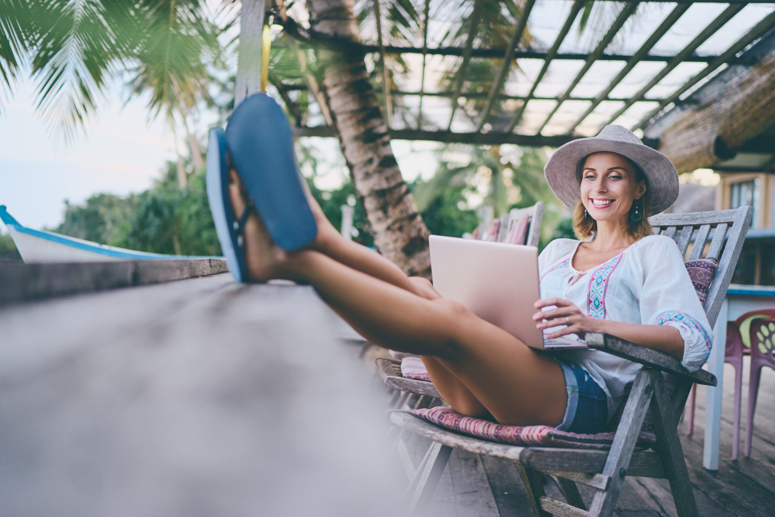 Woman Relaxing on Vacation with Laptop