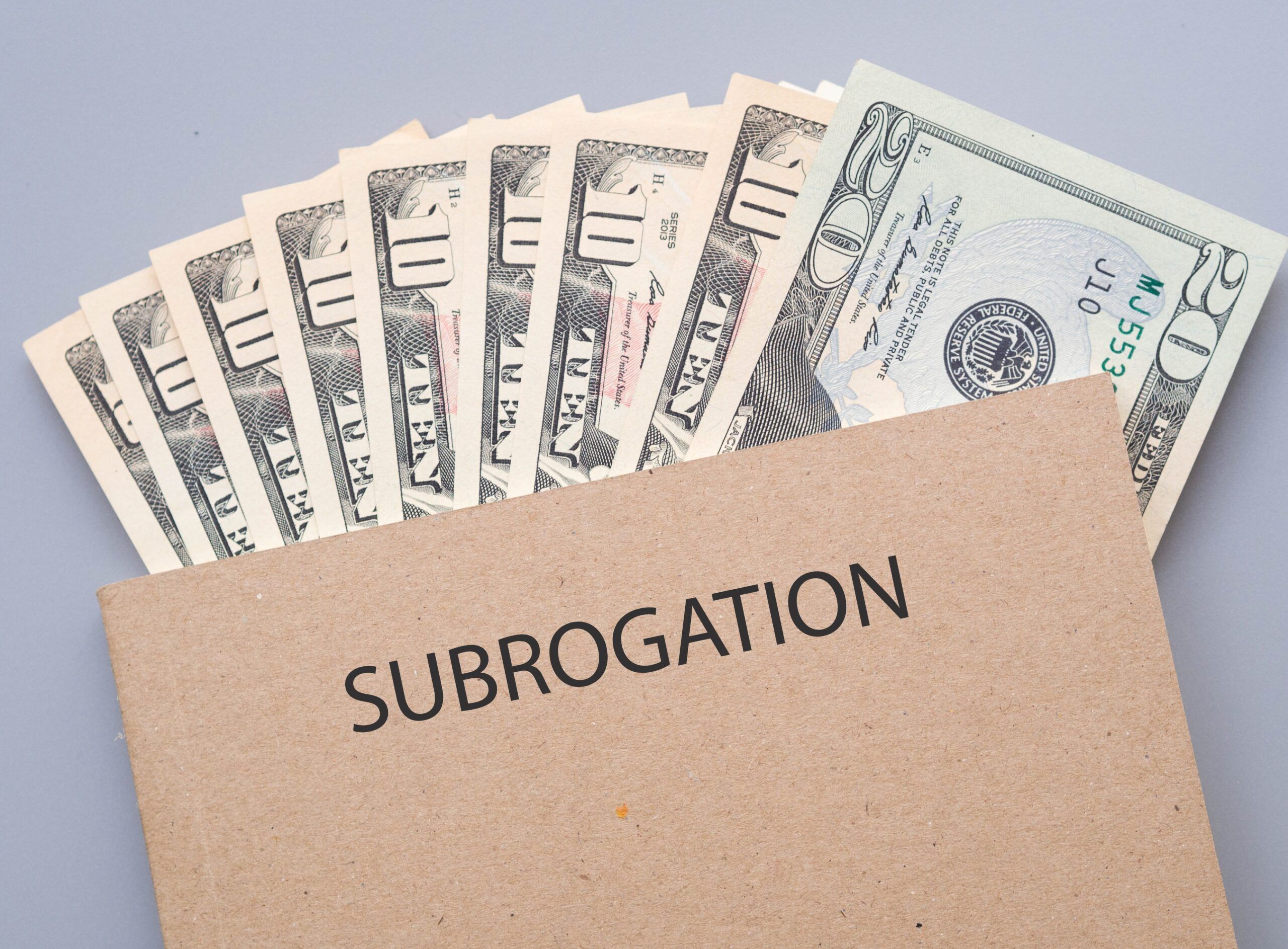 Cash in Tan Folder Labeled Subrogation