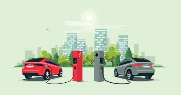 Electric and Gas-Powered Car Fueling Up