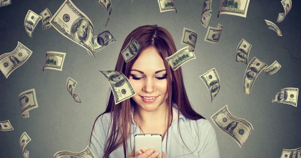Young woman spending money on social media